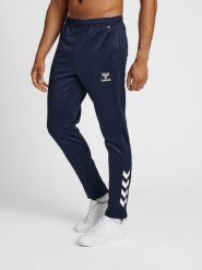 Spodnie dresowe z poliestru Hummel Core XK. Niebieskie szorty męskie HUMMEL, bez wzorów, z dresówki, eleganckie. Za 169.35 zł.
