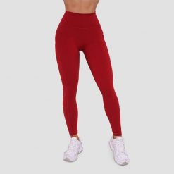 Legginsy damskie fitness z kieszeniami ciemnoczerwone Ignite. Czerwone legginsy damskie GYMBEAM, m, bez wzorów, z elastanu. Za 112.90 zł.