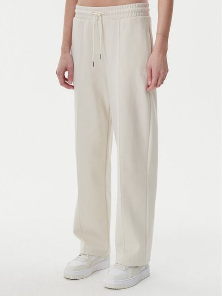 Puma Spodnie dresowe Ess 629774 Beżowy Straight Fit. Brązowe spodnie dresowe damskie Puma, xl, bez wzorów, z bawełny. Za 179.99 zł.