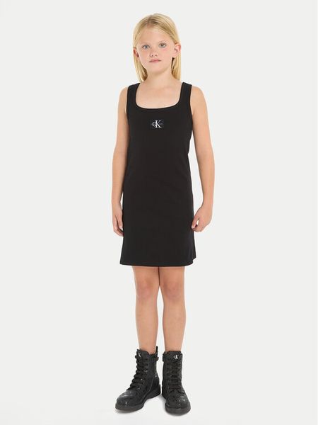 Calvin Klein Jeans Sukienka letnia Badge IG0IG02471 Czarny Regular Fit. Czarne spodnie dziewczęce Calvin Klein Jeans, na lato, bez wzorów, z bawełny, bez ramiączek. Za 179.99 zł.