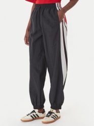 Adidas Spodnie dresowe Sport Santiago KC9116 Czarny Loose Fit. Czarne spodnie sportowe damskie Adidas, s, z dresówki. Za 349.99 zł.