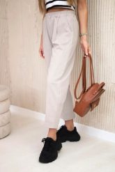 Spodnie z kieszeniami Summer Punto ciemno beżowe. Brązowe spodnie materiałowe damskie KESI, bez wzorów, z bawełny, eleganckie, plus size. Za 188.21 zł.