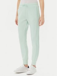 Guess Spodnie dresowe V2YB18 K7UW2 Zielony Regular Fit. Zielone spodnie dresowe damskie Guess, s, z aplikacjami, z dresówki. Za 229.99 zł.