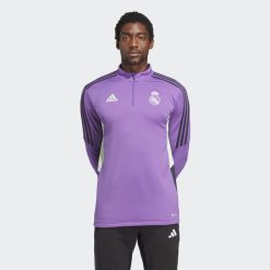 Bluza do piłki nożnej męska Adidas Real Madrid Condivo 22 Training Top. Fioletowe bluzy bez kaptura męskie Adidas, m, z materiału. W wyprzedaży za 216.00 zł.