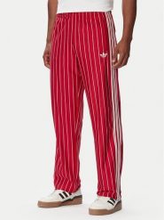 Adidas Spodnie dresowe Firebrid Pinstripes Track KR7230 Czerwony Regular Fit. Czerwone spodnie dresowe męskie Adidas, bez wzorów, z dresówki. Za 349.99 zł.