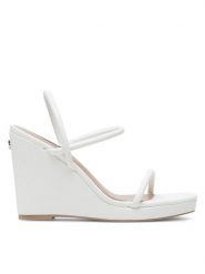 Nine West Sandały WFA2624-1 Biały. Białe sandały damskie Nine West, bez wzorów, z syntetyku, bez obcasa, na koturnie. Za 131.99 zł.