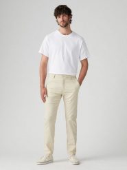 Levi's Spodnie chino w kolorze beżowym rozmiar: W32/L32. Brązowe spodnie materiałowe męskie Levi's, bez wzorów. Za 184.46 zł.