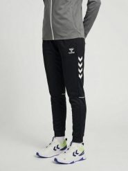Damskie spodnie dresowe Hummel Core 2.0 Track. Białe spodnie sportowe damskie HUMMEL, xs, z dresówki, na fitness i siłownię. Za 246.00 zł.