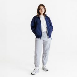 Spodnie dresowe unisex Decathlon AFLF szare. Szare spodnie dresowe damskie Decathlon, xl, z dresówki, na fitness i siłownię. W wyprzedaży za 99.99 zł.