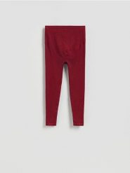 Bezszwowe legginsy - bordowy. Czerwone legginsy damskie Reserved, l, bez wzorów, z dzianiny. Za 89.99 zł.