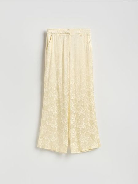 Wzorzyste spodnie z wiskozy - jasnożółty. Żółte spodnie materiałowe damskie Reserved, bez wzorów, z wiskozy. Za 219.99 zł.