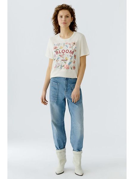 Oui Koszulka w kolorze kremowym ze wzorem rozmiar: 46. Brązowe bluzki damskie Oui, bez wzorów, z bawełny, bez kołnierzyka. Za 150.72 zł.