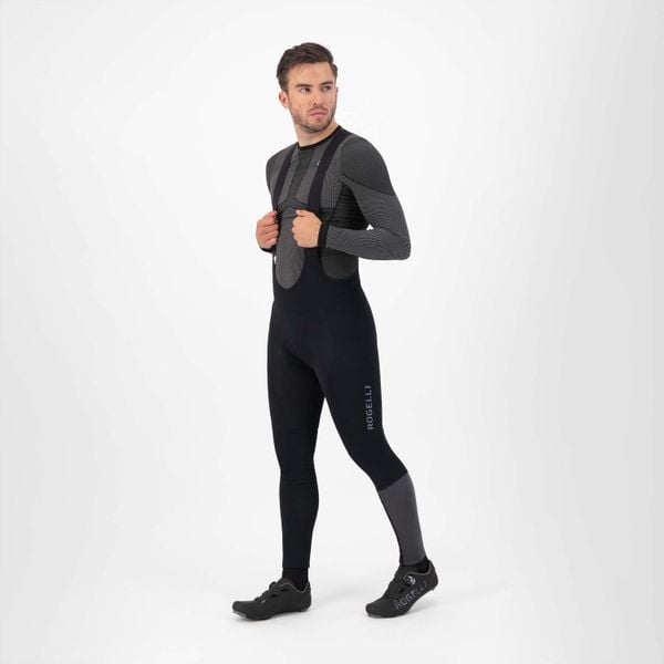 Spodnie rowerowe męskie Rogelli Essential HiVis z wkładką żelową. Czarne spodnie materiałowe męskie Rogelli, bez wzorów, sportowe. Za 395.80 zł.