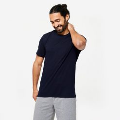 Koszulka z krótkim rękawem męska Domyos Gym & Pilates 500 slim. Czarne szorty męskie DOMYOS, bez wzorów, z bawełny, biznesowe. Za 39.99 zł.