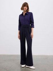 BGN Spodnie w kolorze granatowym rozmiar: 34. Niebieskie spodnie materiałowe damskie BGN, bez wzorów, z materiału. Za 100.99 zł.