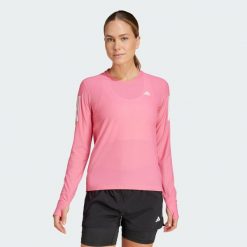 Koszulka Own The Run Long Sleeve. Czerwone t-shirty damskie Adidas, s, bez wzorów, z materiału, bez kołnierzyka. Za 189.05 zł.