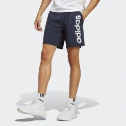 AEROREADY Essentials Chelsea Linear Logo Shorts. Niebieskie szorty męskie Adidas, m, z materiału, na fitness i siłownię. Za 111.00 zł.