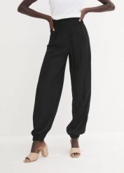 Spodnie palazzo z lejącej wiskozy. Czarne spodnie materiałowe damskie bonprix, bez wzorów, z wiskozy. Za 99.99 zł.