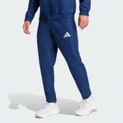 Spodnie męskie adidas Entrada 26 Presentation. Niebieskie spodnie materiałowe męskie Adidas, bez wzorów, z materiału. Za 179.00 zł.