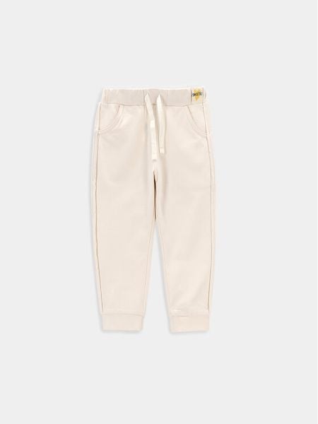 Coccodrillo Spodnie dresowe WC4120101CEN Écru Regular Fit. Spodnie dziewczęce COCCODRILLO, z bawełny. Za 39.99 zł.
