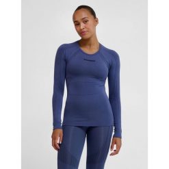 Damska koszulka bezszwowa z długim rękawem Hummel Shaping. Niebieskie bluzki sportowe damskie HUMMEL, bez kołnierzyka, bez ramiączek. Za 140.00 zł.