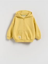 Bawełniana bluza oversize - żółty. Żółte bluzy i bluzki niemowlęce Reserved, bez wzorów, z bawełny, bez ramiączek, bez kaptura. Za 59.99 zł.