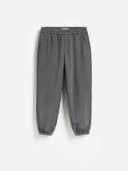 Spodnie jogger z polarem - ciemnoszary. Szare spodnie materiałowe męskie Reserved, bez wzorów, z polaru. Za 149.99 zł.