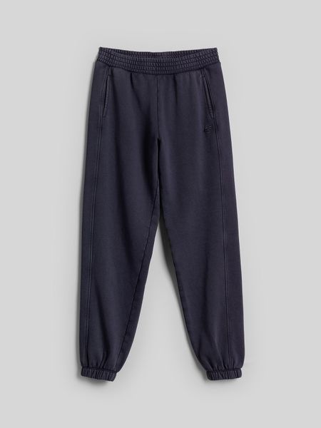4F Spodnie dresowe joggery damskie - granatowe XS. Niebieskie spodnie dresowe damskie 4f, xs, bez wzorów, z bawełny. Za 149.99 zł.