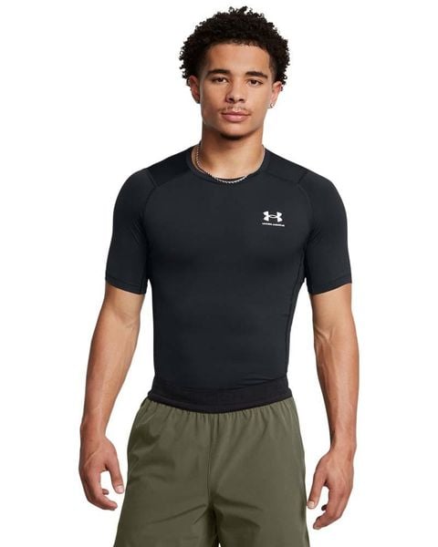 Under Armour UA HG ARMOUR COMP SS Koszulka treningowa męska. Szare t-shirty sportowe męskie Under Armour, l, z materiału, bez ramiączek, na fitness i siłownię. Za 109.99 zł.