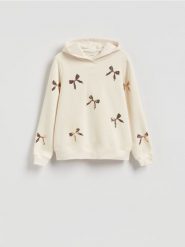 Bluza ze świątecznym motywem - złamana biel. Bluzy bez kaptura damskie Reserved, l, z bawełny. Za 99.99 zł.