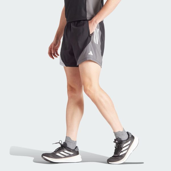 Szorty Own The Run Colorblock. Brązowe szorty męskie Adidas, bez wzorów, z materiału, sportowe. Za 165.70 zł.