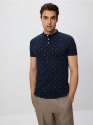 Koszulka polo regular z bawełny - granatowy. Niebieskie koszulki polo męskie Reserved, l, bez wzorów, z bawełny, bez ramiączek. Za 69.99 zł.