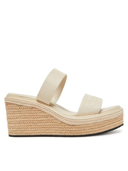 Calvin Klein Klapki Wedge Sandal 50 - He HW0HW02375 Kremowy. Białe espadryle damskie CALVIN KLEIN, bez wzorów, ze skóry, bez obcasa. Za 284.99 zł.