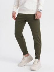 Spodnie męskie dresowe z przeszyciem i zamkiem na nogawce - oliwkowe V3. Zielone spodnie dresowe męskie Ombre Clothing, bez wzorów, z bawełny. W wyprzedaży za 69.99 zł.