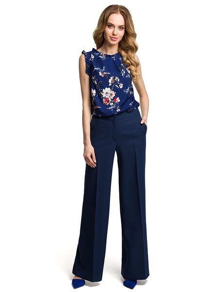 Made of emotion Spodnie w kolorze granatowym rozmiar: XXL. Niebieskie spodnie materiałowe damskie Made Of Emotion, bez wzorów, z materiału. Za 169.99 zł.