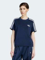 Adidas Koszulka w kolorze granatowym rozmiar: S. Niebieskie bluzki damskie Adidas, s, bez wzorów, bez kołnierzyka, bez ramiączek. Za 119.95 zł.