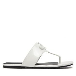 Japonki Calvin Klein Jeans. Białe klapki damskie Calvin Klein Jeans, bez wzorów, z jeansu, bez obcasa. Za 219.99 zł.