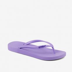 Damskie klapki Coqui. Fioletowe klapki damskie Coqui, bez wzorów, z materiału, bez obcasa. Za 130.99 zł.