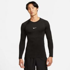 Koszulka Mężczyzna Nike Pro Dri-Fit czarny. Czarne koszulki męskie z długim rękawem Nike, m, z materiału. Za 178.35 zł.