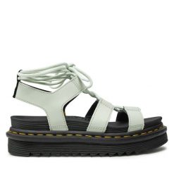 Sandały Dr. Martens. Białe sandały damskie Dr. Martens, bez wzorów, bez obcasa, na płaskiej podeszwie. Za 359.99 zł.