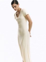 Sukienka z lyocellem - jasnożółty. Żółte sukienki damskie Reserved, l, bez wzorów, z dzianiny, bez kołnierzyka, bez ramiączek, dopasowane. Za 279.99 zł.