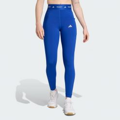 Legginsy Techfit Stash Pocket Full-Length. Niebieskie legginsy damskie Adidas, l, bez wzorów. W wyprzedaży za 123.38 zł.