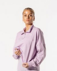 Damska bluza Luxe z krótkim zamkiem, oversize, ze ściągaczem w pasie – liliowy. Czerwone bluzy sportowe damskie AESTHETIC WOLF, s, z bawełny. Za 149.99 zł.