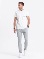 Spodnie męskie dresowe typu jogger - szary melanż V2. Szare spodnie dresowe męskie Ombre Clothing, bez wzorów, z bawełny. W wyprzedaży za 69.99 zł.