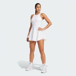 Sukienka Tennis Climacool Y-Dress. Niebieskie sukienki damskie Adidas, xs, bez wzorów, sportowe, bez kołnierzyka, bez ramiączek, dopasowane. Za 369.00 zł.