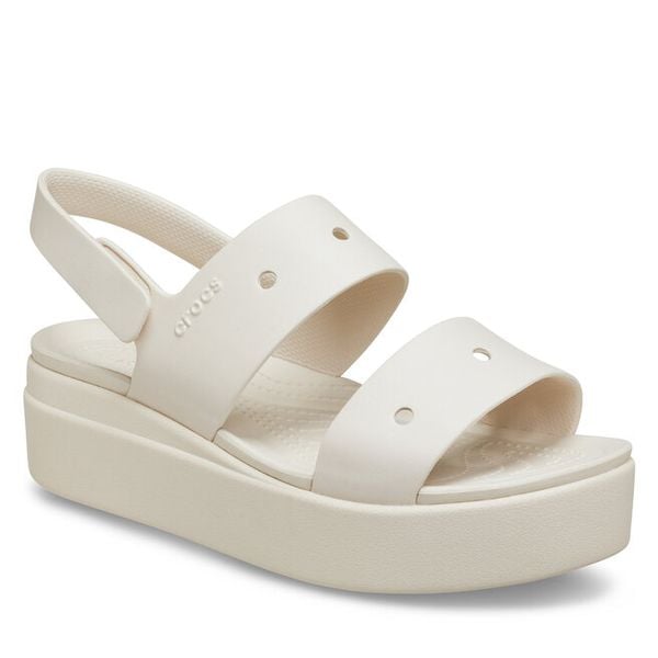 Sandały Crocs. Brązowe sandały damskie Crocs, bez wzorów, bez obcasa, na płaskiej podeszwie. Za 259.99 zł.