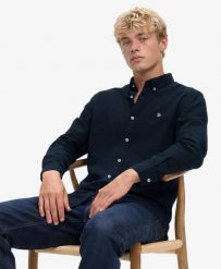 Superdry Klasyczna koszula Oxford z długim rękawem – 100% bawełna organiczna,. Niebieskie koszule damskie Superdry., s, bez wzorów, z bawełny, bez kołnierzyka, bez ramiączek. Za 323.85 zł.
