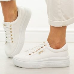 Białe trampki damskie Lee Cooper 4474. Białe trampki i tenisówki damskie Lee Cooper, bez wzorów, z gumy. Za 139.00 zł.