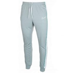 Męskie Spodnie Do Biegania Academy DriFIT. Szare spodnie materiałowe męskie Nike, bez wzorów, z tkaniny. Za 200.99 zł.
