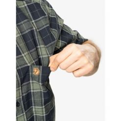 Koszula podróżnicza męska Fjallraven Ovik Travel Shirt S/S. Niebieskie koszule męskie Fjällräven, m, bez wzorów, bez kołnierzyka, bez ramiączek. Za 339.99 zł.